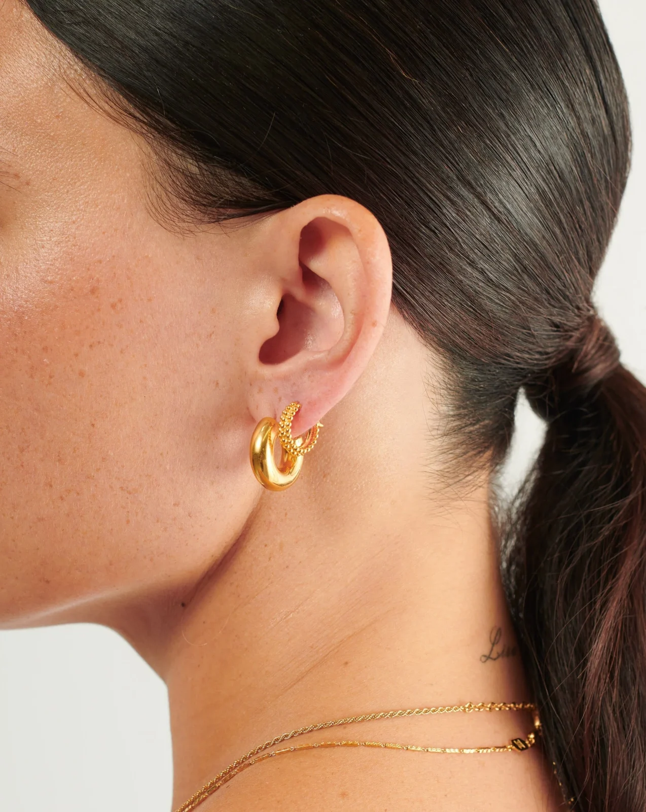 Chubby Tunnel Small Hoop Earrings | 18ct Gold Plated - Image 2