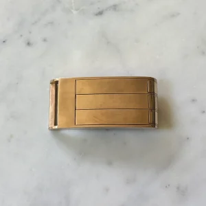 THE BELT BUCKLE